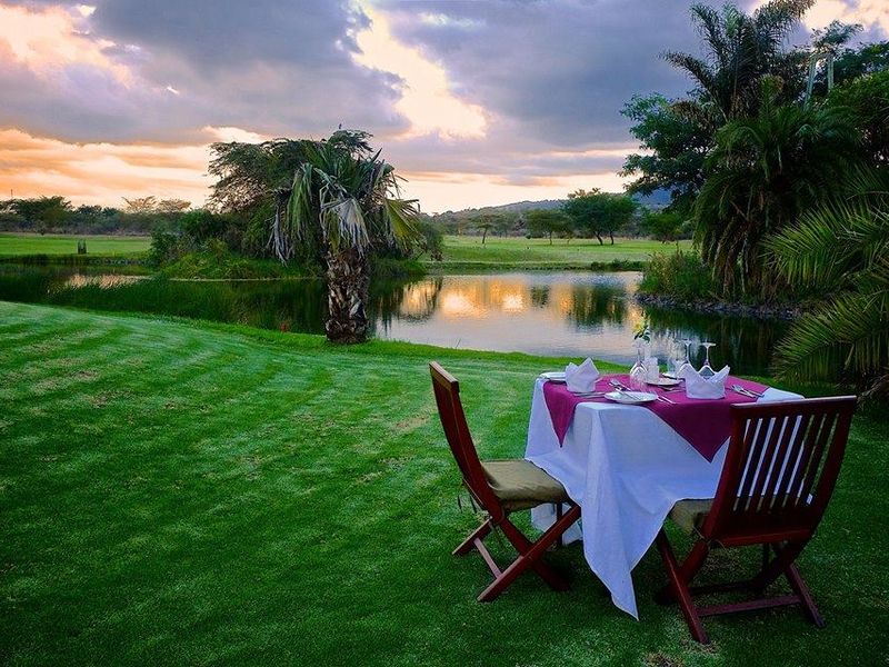 Beautiful golf course by the pond in Kenya