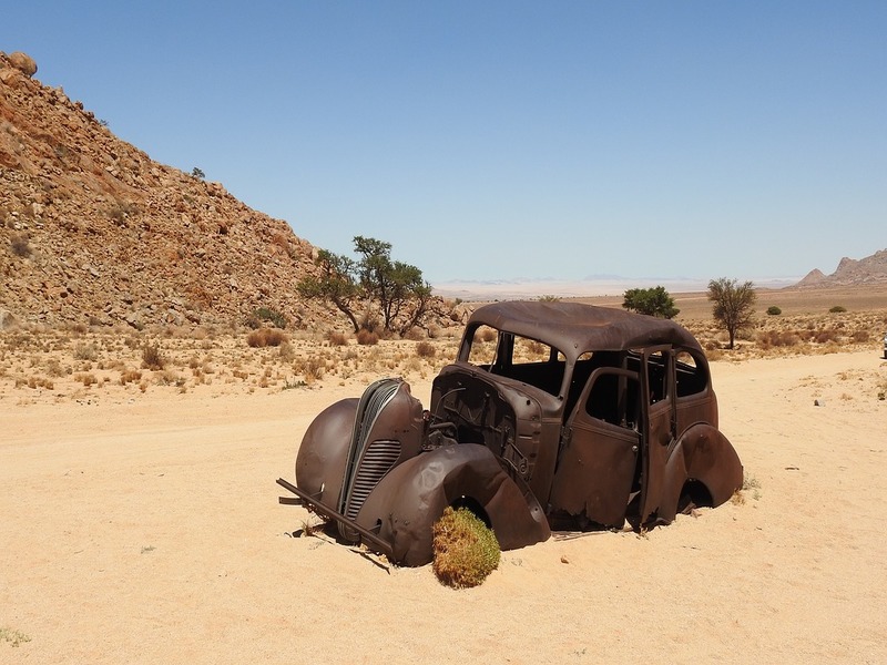 Broken down car in a desert