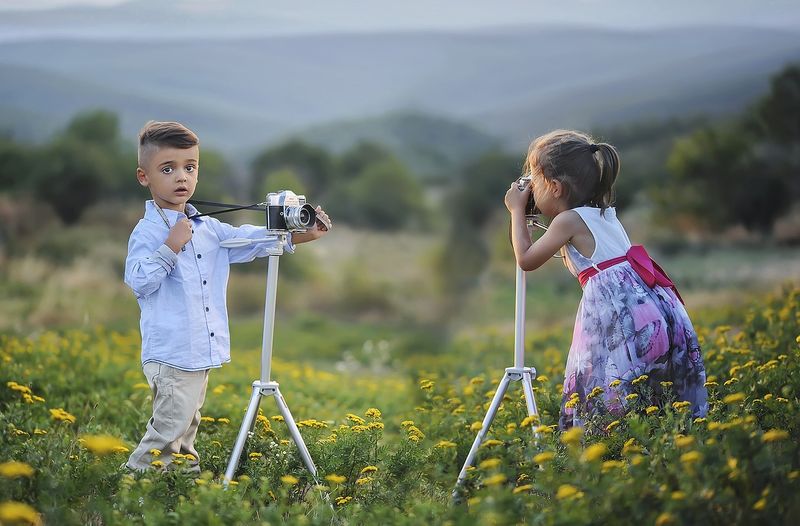 Kids pretending to be photographers