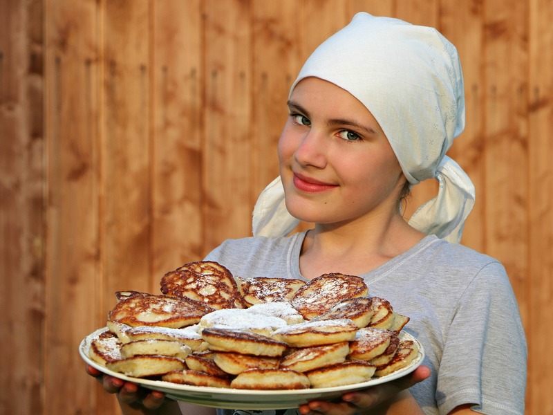 Girl with plate of pancakes