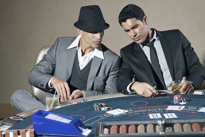 Two men playing poker